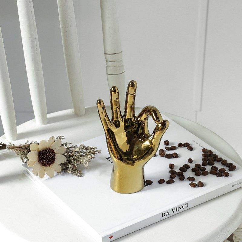 Golden Hand Gesture - Area Collections