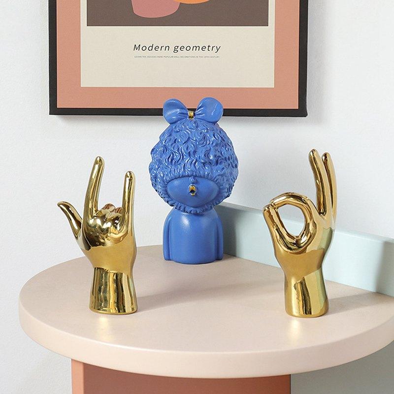 Golden Hand Gesture - Area Collections